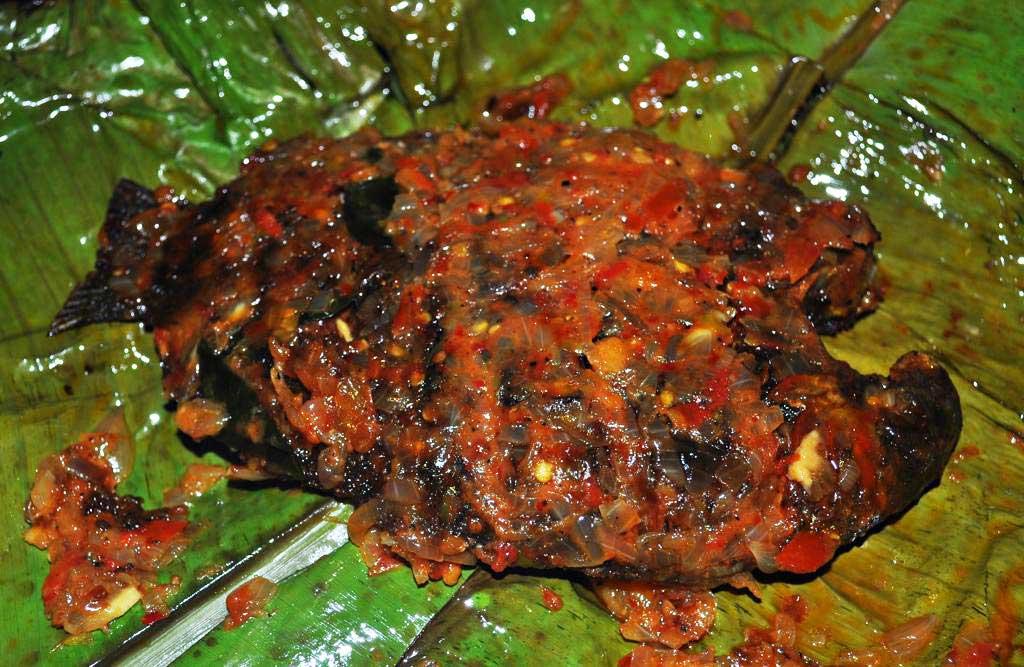 karimeen pollichathu pearl spot cooked